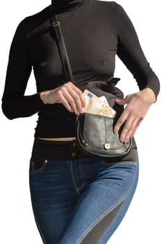 Beautiful lady pulls out of her handbag a stack of euro isolated on white