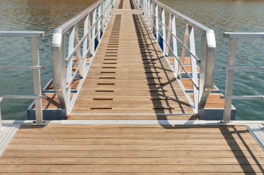 Wooden walkway serving Amieira pier on the banks of the reservoir of Alqueva, Alentejo, Portugal