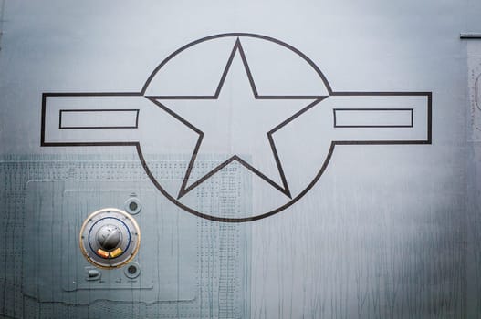United States of America air force fighter plane detailed view of metal exterior with star symbol.