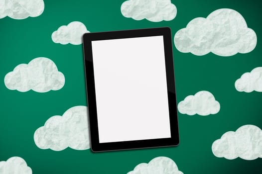 tablet on green chalk board with clouds