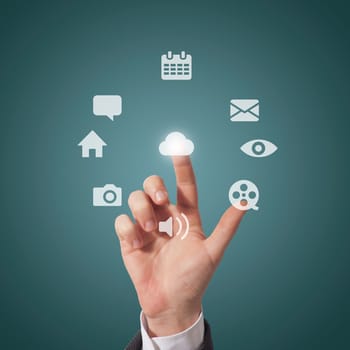 business man touching icons on screen, grey background