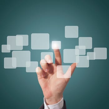 business man touching virtual screen, blue background