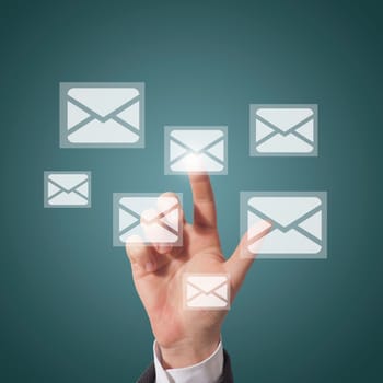 business man open email touching icon on screen, blue background