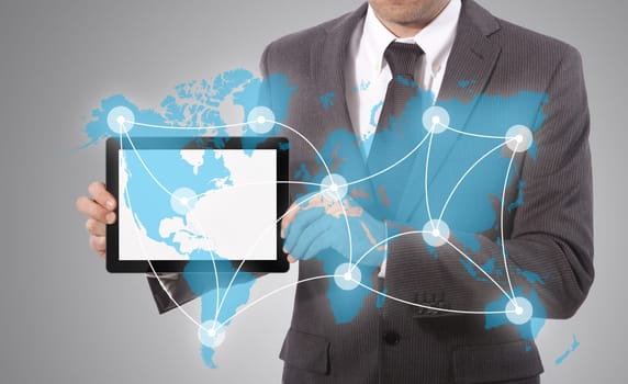 business man show world connection map throught tablet