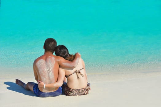 happy young asian couple have fun and romantic time at  summer on beautiful white sand beach