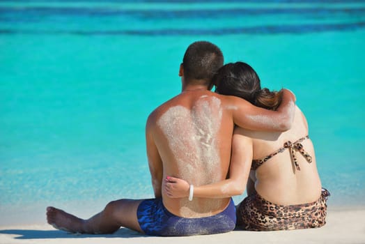 happy young asian couple have fun and romantic time at  summer on beautiful white sand beach