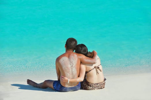 happy young asian couple have fun and romantic time at  summer on beautiful white sand beach