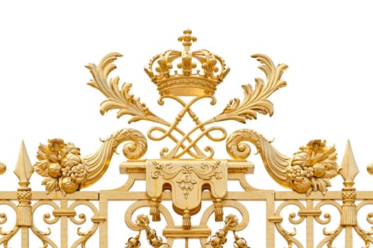Golden ornate gate of Chateau de Versailles isolated on white background. Paris, France, Europe.