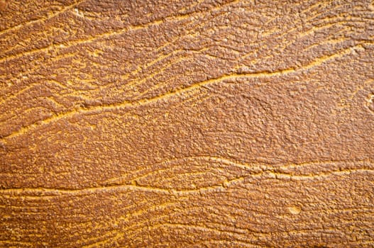 Yellow stone background with veins running through it. Lots of texture, detail and copy space.