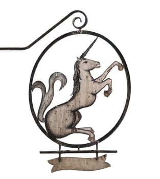 Old medieval sign of tavern, pub, bar or shop depicting unicorn. Isolated on white background, place for text under the unicorn.