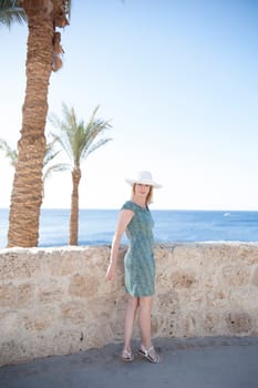 Woman with palm trees