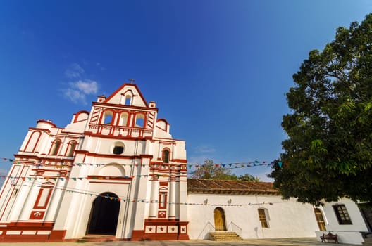 Facade of a white colonial church in Chiapa de Corzo in Chiapas, Mexico
