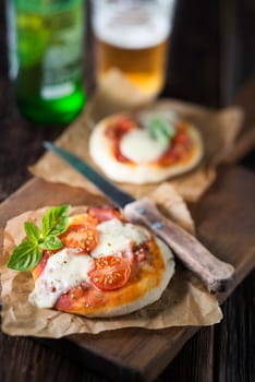 Small pizzas and beer close up shoot