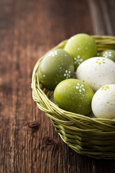 Easter eggs in a basket close up shoot