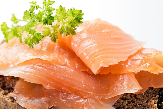 Fresh smoked salmon sandwich on white close up shoot
