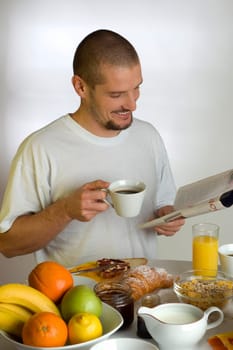 young men at the table for breakfast reading