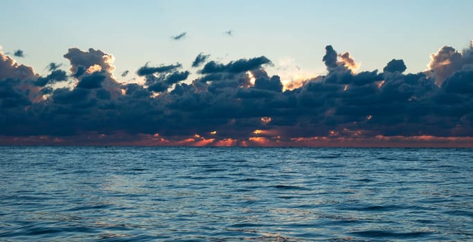 blue and orange sunset on the sea