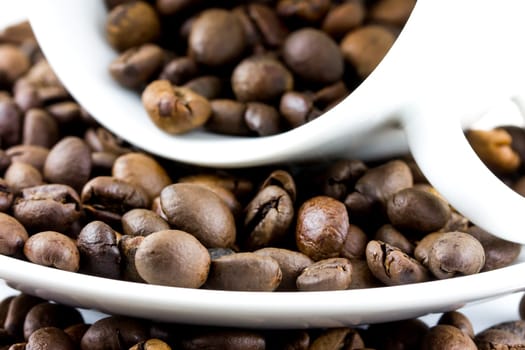 Coffee beans in a cup