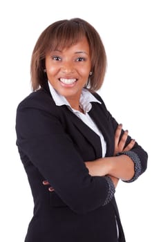 Smiling african american woman with folded arms, isolated on white background
