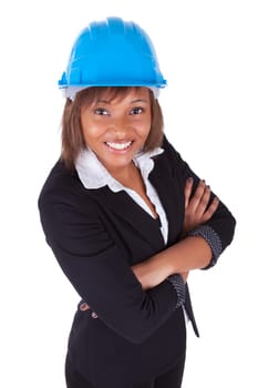 Confident Black African American woman architect smiling with folded arms, isolated on white background