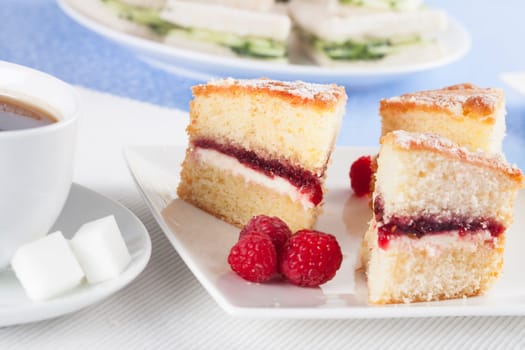 Victoria sponge cake with raspberries for afternoon tea.
