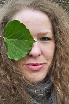 Woman with leaf