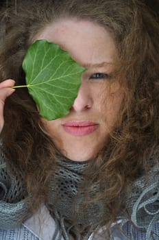 Woman with leaf