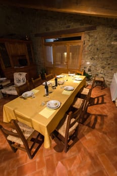 table set in a cottage in Tuscany