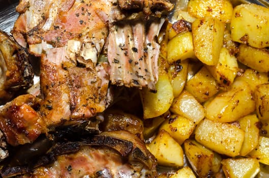 lamb with baked potatoes in Italy