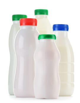 Composition with plastic bottles of milk products