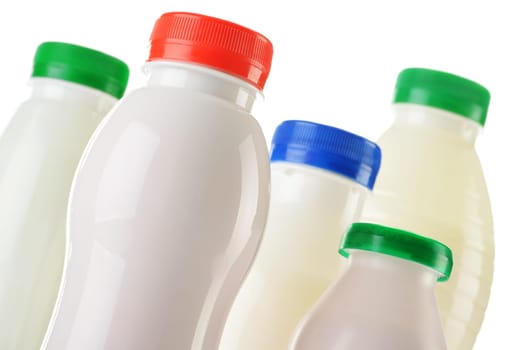 Composition with plastic bottles of milk products
