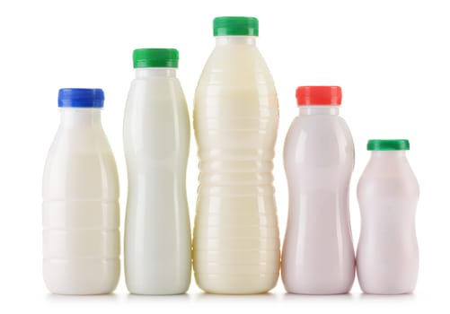 Composition with plastic bottles of milk products