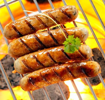 Helalthy smokies on barbecue with Open Flames