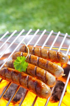 Close up shot of Italian sausage on the grill