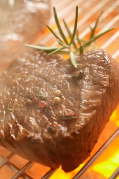 Close up shot of meat on the grill barbecue