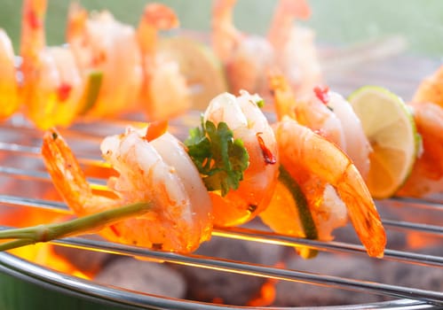Close up view of Mexican grilled shrimp on stick