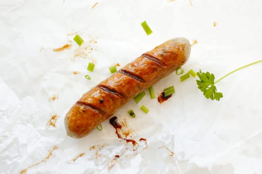 Smoked Italian sausage against the white background