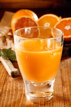 A glass with healthy fresh orange and grapefruit juice