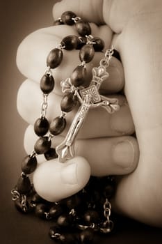 Crucifix in hand