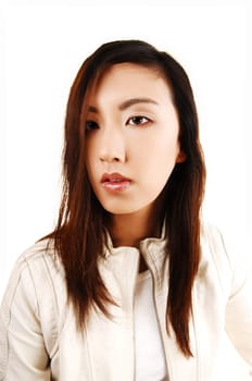A portrait shoot of a young beautiful chinese woman for white background in a white jacket and brunette hair.