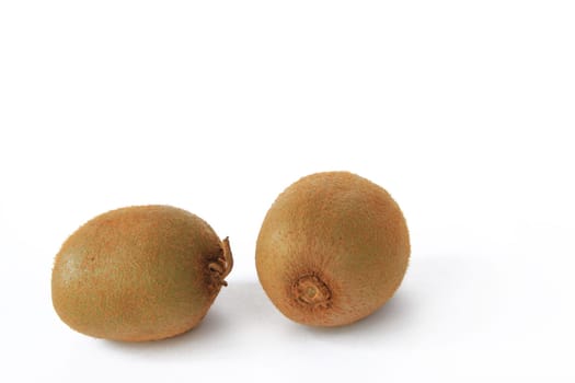 Two kiwi fruits (Actinidia deliciosa),isolated against white background