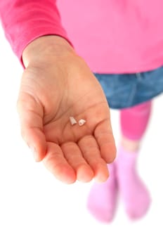 Hand with milk teeth