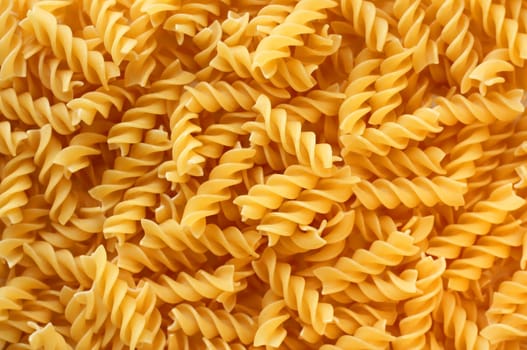 Pasta texture background. Pasta is a staple food of traditional Italian cuisine.