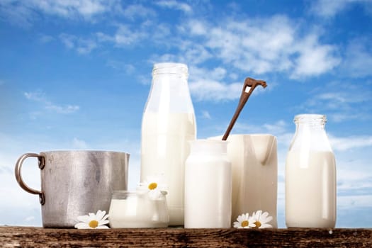 lactose-free dairy products in front of blue skies