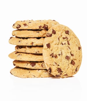 Stack of cookies and a standing cookie against a white background