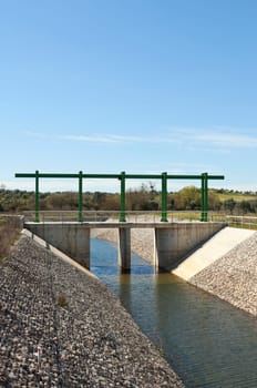Almost finished sluice gate in the water diversion canal upstream the Alvito reservoir near Oriola village, part of the Alqueva Irrigation Plan, Alentejo, Portugal