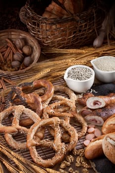 Group of different bakery products and seeds on the vertical