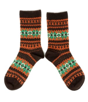 pair of wool socks with a pattern. Isolate on white.
