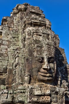 Smiling faces in the Temple of Angkor Wat