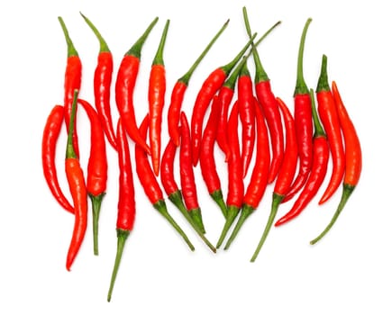 Pile of red chili peppers isolated on white background